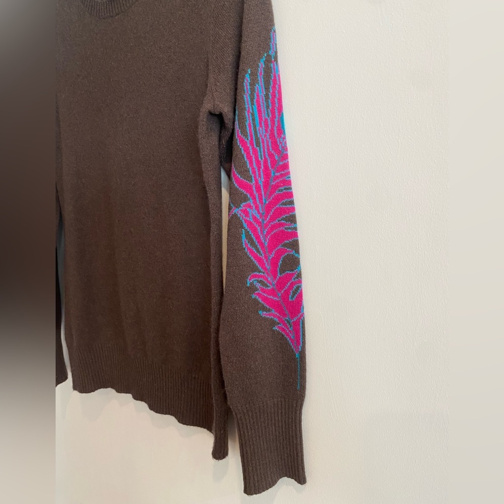 Cashmere Sweater with Bright Pink Peacock Feather Detail Down Left Sleeve.